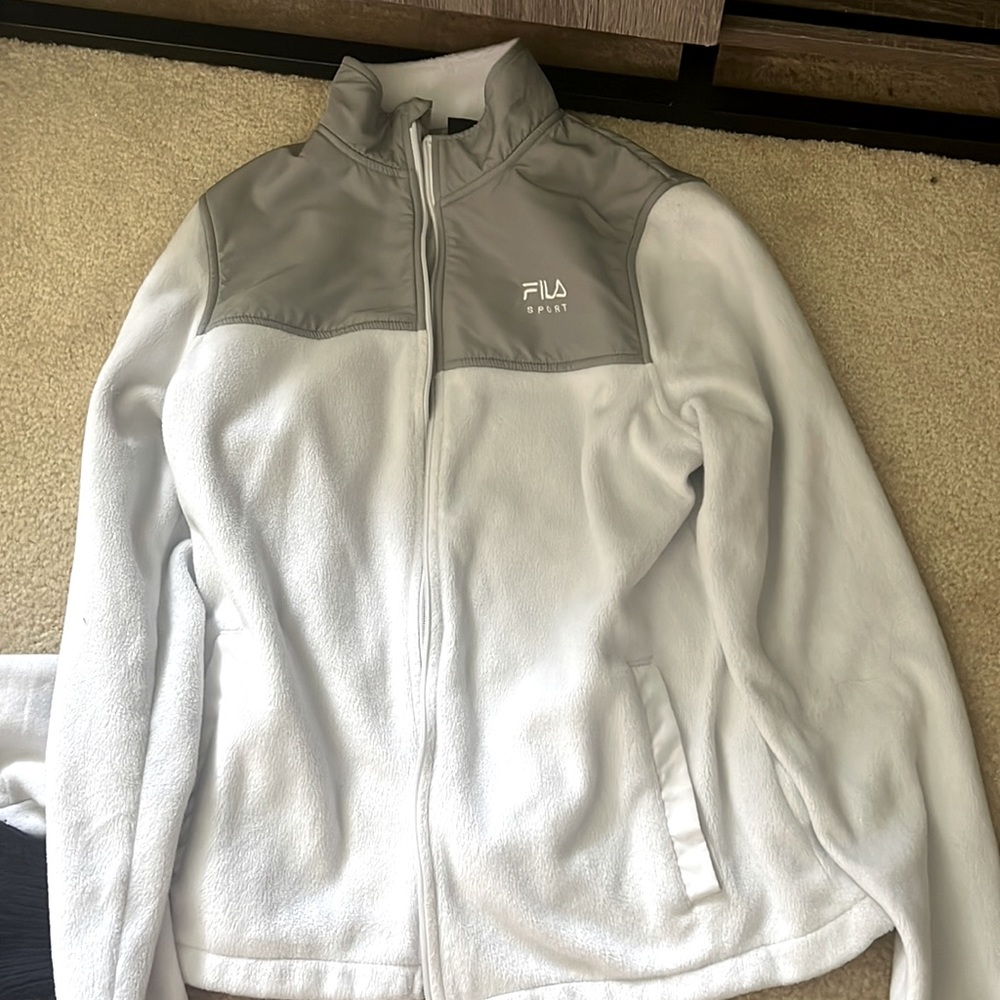 this is a Fila Sport zip up jacket, worn twice